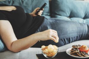 Image of a person laying on a couch