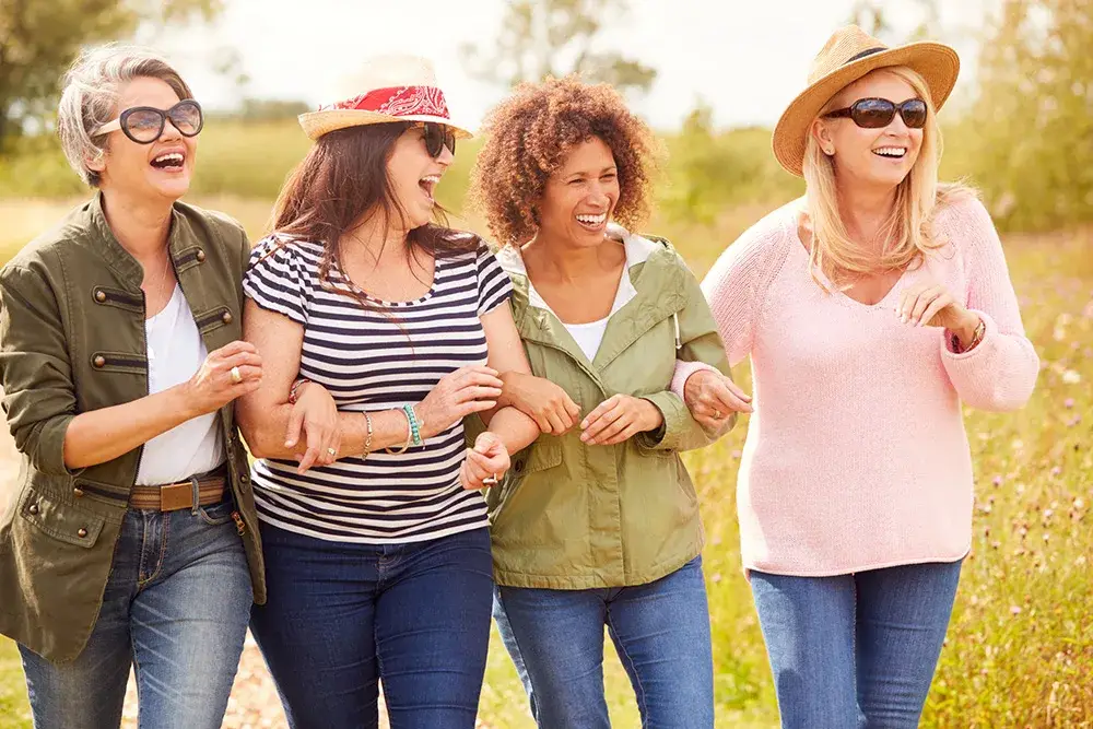 BHRT for menopause. a group of women laughing together