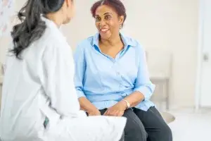 a patient meeting with a provider during a weight loss assessment