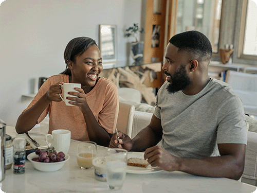 happy-couple-eating-healthy-after-losing-weight-with-blue-sky-md-medical-weight-loss
